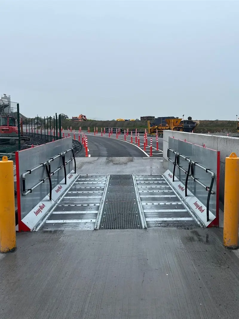 Inset SiteWash 6 wheel wash at a site exit, finished flush with the road