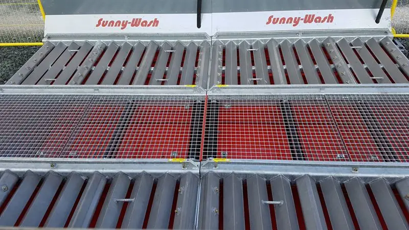Galvanized jetted wash grids